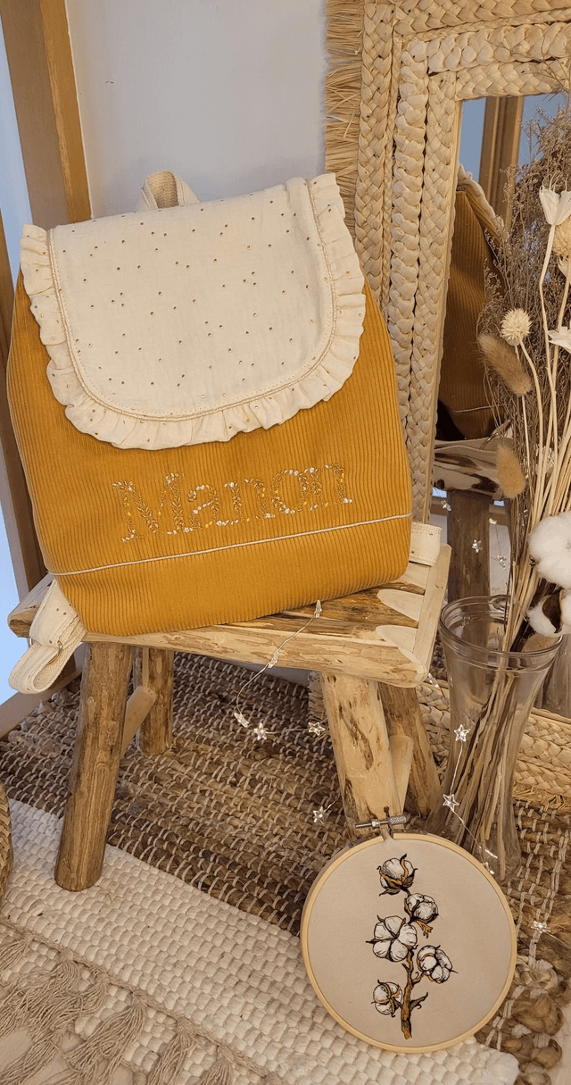 Sac à dos moutarde et blanc cassé 