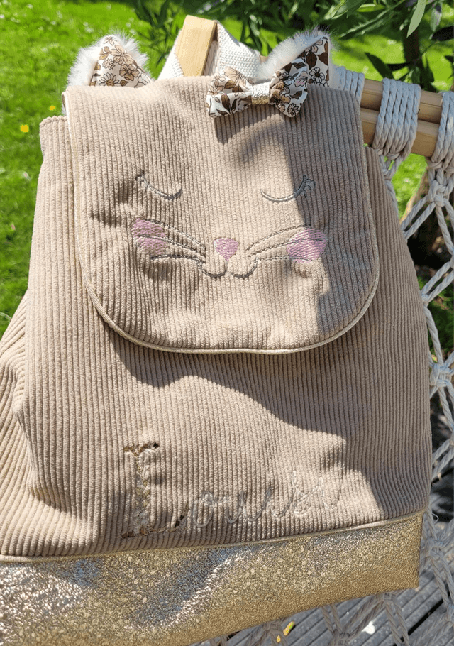 Sac à dos petit chat 🐱  simili cuir et noeud