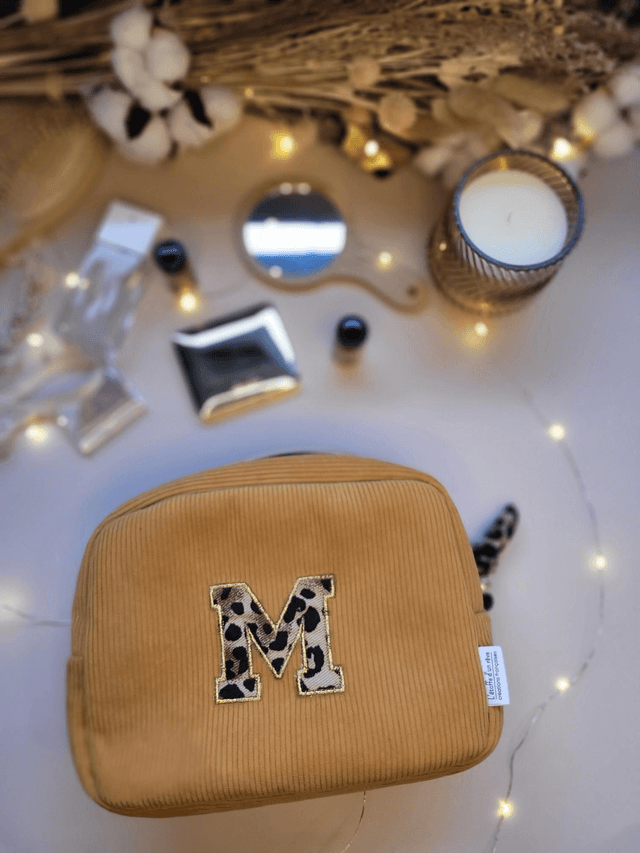 Trousse de toilette appliqué léopard 